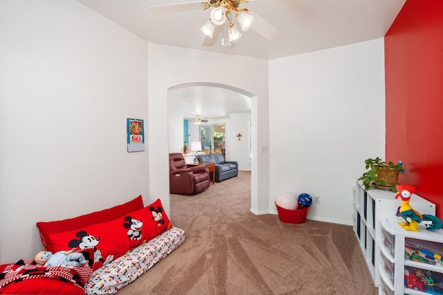 10597 E Fieldstone Ave, Clovis, CA 93619 - bedroom featuring arched walkways, carpet, ceiling fan, and baseboards