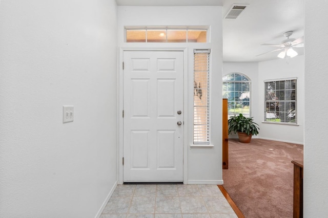 10597 E Fieldstone Ave, Clovis, CA 93619 - entrance foyer with ceiling fan, baseboards, and light colored carpet