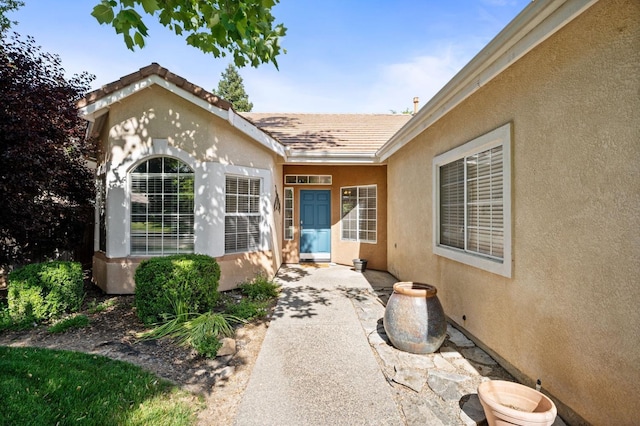 10597 E Fieldstone Ave, Clovis, CA 93619 - entrance to property with stucco siding