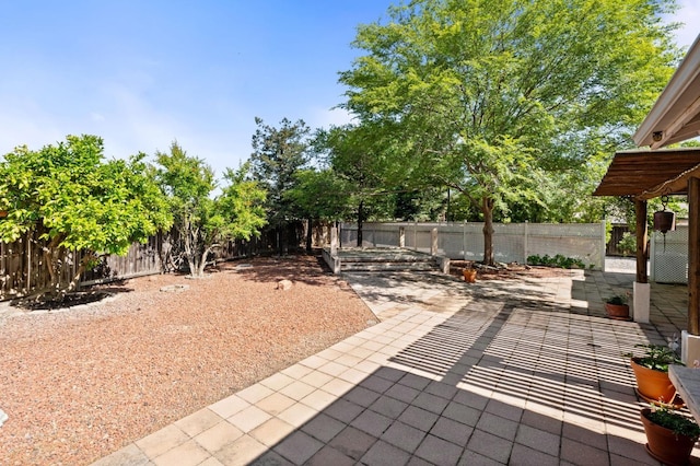 10597 E Fieldstone Ave, Clovis, CA 93619 - view of patio / terrace with a fenced backyard
