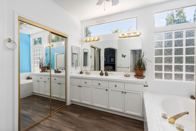 10597 E Fieldstone Ave, Clovis, CA 93619 - full bath featuring ceiling fan, double vanity, and healthy amount of natural light