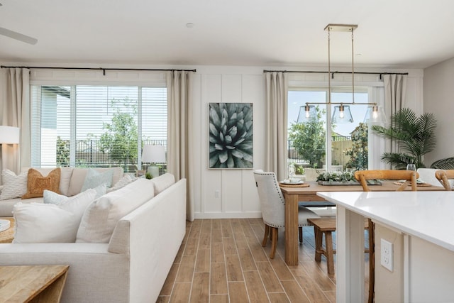 dining room with light wood-style flooring and baseboards