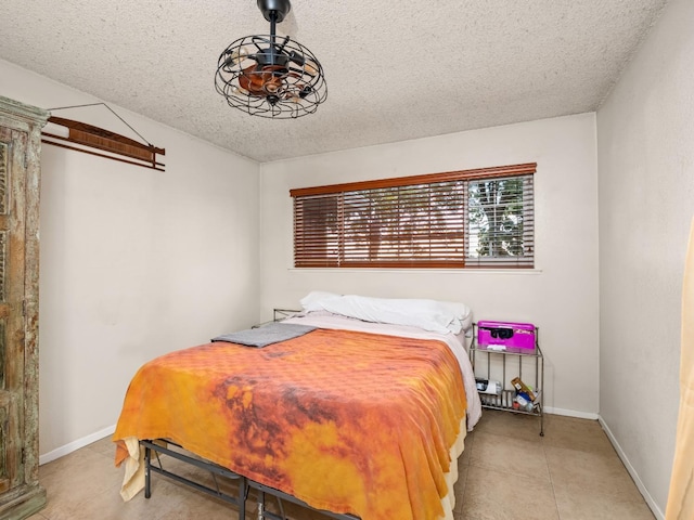 2204 Peach Ave Unit 1, Clovis, CA 93612 - bedroom with a textured ceiling and baseboards