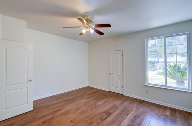 30925 Pennyroyal Ln, Prather, CA 93651 - unfurnished room featuring wood finished floors, ceiling fan, and baseboards