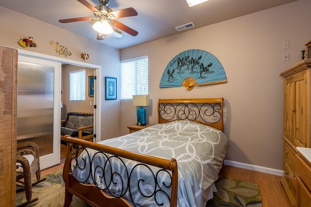 30925 Pennyroyal Ln, Prather, CA 93651 - bedroom with wood finished floors, baseboards, and a ceiling fan