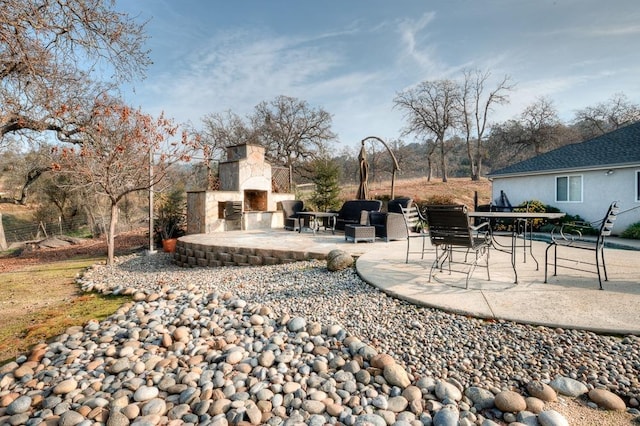 30925 Pennyroyal Ln, Prather, CA 93651 - view of patio / terrace featuring an outdoor stone fireplace