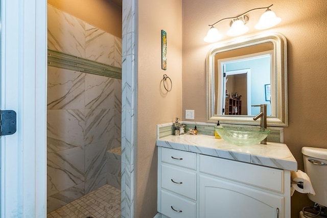 30925 Pennyroyal Ln, Prather, CA 93651 - full bath with a marble finish shower, toilet, and vanity
