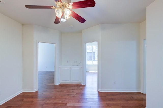 30925 Pennyroyal Ln, Prather, CA 93651 - unfurnished room featuring wood finished floors, a ceiling fan, baseboards, and a smoke detector