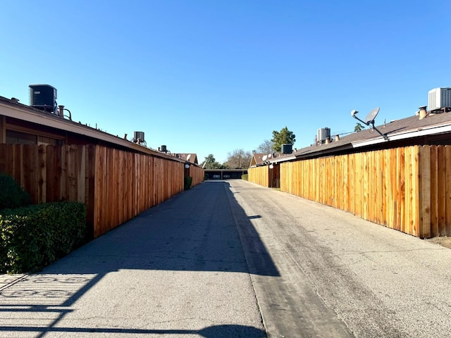 view of asphalt alley