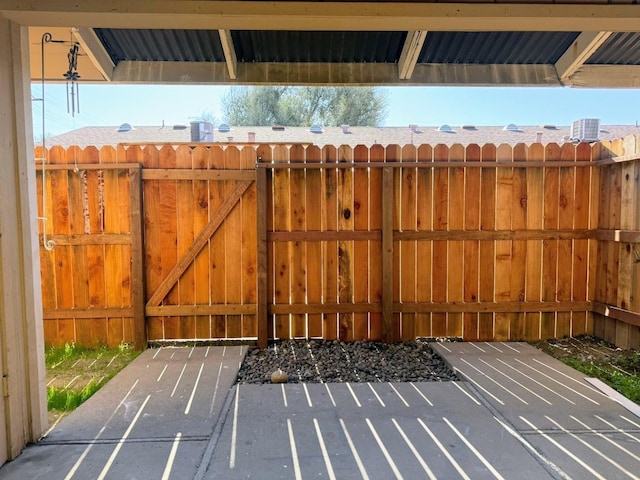 gate with fence and a patio
