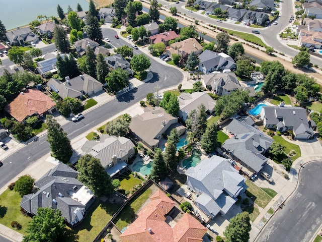 aerial overview of property's location with nearby suburban area