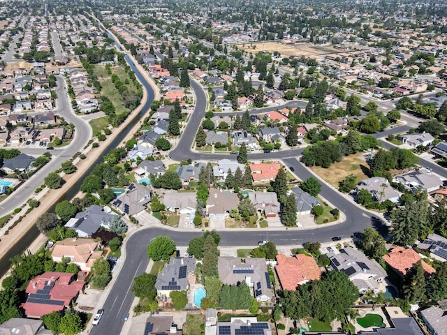aerial view of property's location featuring nearby suburban area