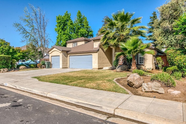 view of front of house with an attached garage, driveway, a front lawn, stucco siding, and a tiled roof