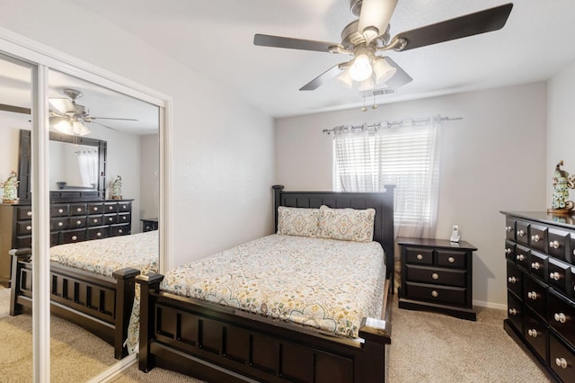 bedroom featuring carpet floors, ceiling fan, and baseboards
