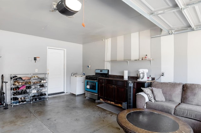 garage with a garage door opener and a sink
