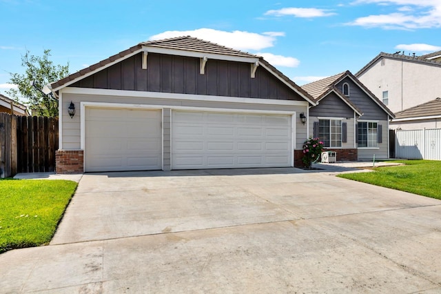 view of front facade with brick siding, concrete driveway, a garage, and board and batten siding