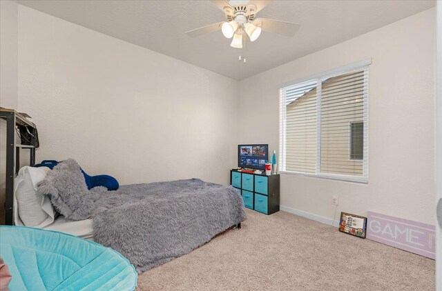 841 Corazon Ave, Clovis, CA 93619 - carpeted bedroom featuring baseboards and ceiling fan