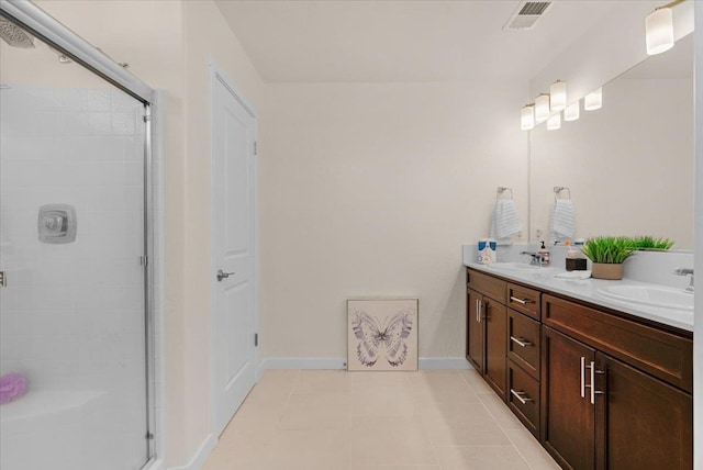 841 Corazon Ave, Clovis, CA 93619 - full bathroom featuring double vanity, a shower stall, and tile patterned floors