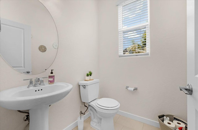 841 Corazon Ave, Clovis, CA 93619 - half bath featuring baseboards and tile patterned floors