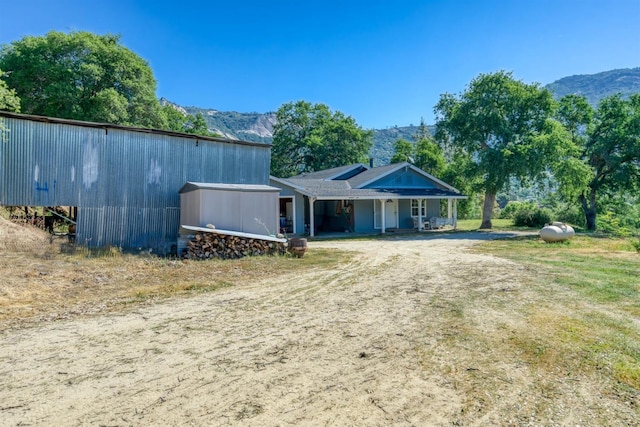 28302 Tollhouse Rd, Tollhouse, CA 93667 - view of front facade featuring a mountain view and dirt driveway