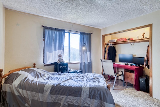 28302 Tollhouse Rd, Tollhouse, CA 93667 - bedroom with a textured ceiling, a closet, and carpet