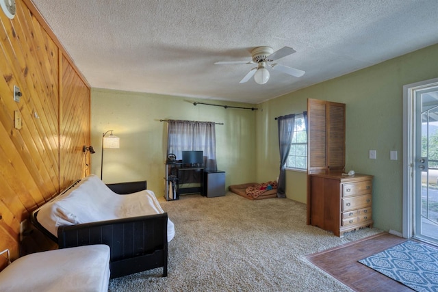 28302 Tollhouse Rd, Tollhouse, CA 93667 - carpeted bedroom with multiple windows, ceiling fan, a textured ceiling, and access to exterior