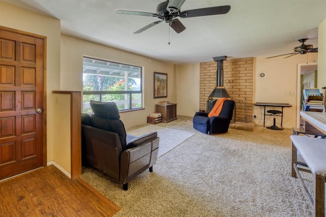 28302 Tollhouse Rd, Tollhouse, CA 93667 - living area featuring a ceiling fan and a wood stove