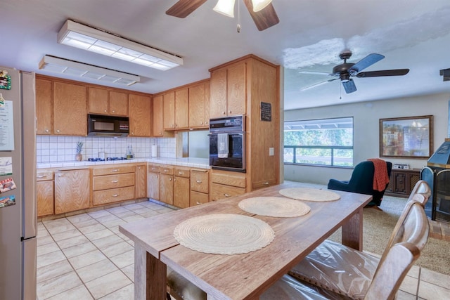 28302 Tollhouse Rd, Tollhouse, CA 93667 - kitchen with black appliances, ceiling fan, tasteful backsplash, light tile patterned floors, and tile countertops