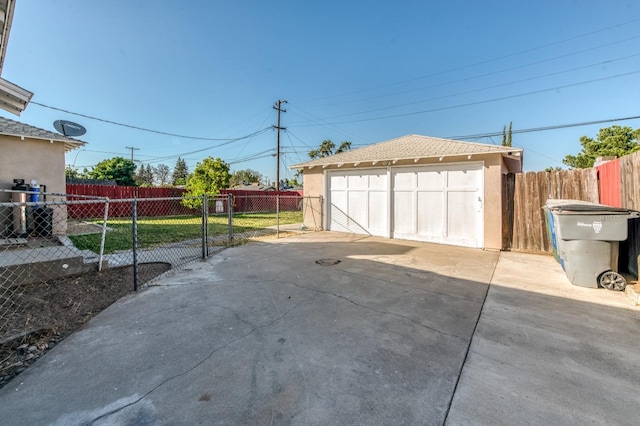 detached garage with fence