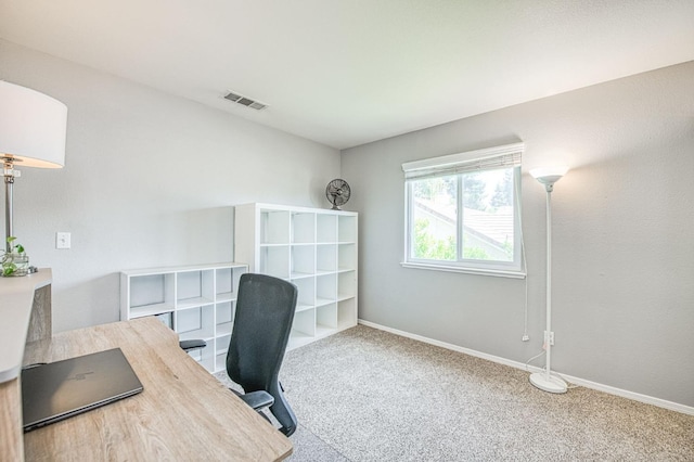 carpeted office with baseboards