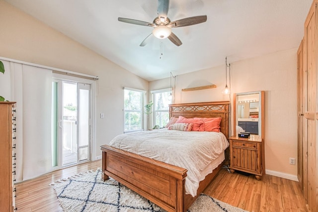 bedroom featuring access to outside, light wood-style flooring, lofted ceiling, baseboards, and ceiling fan