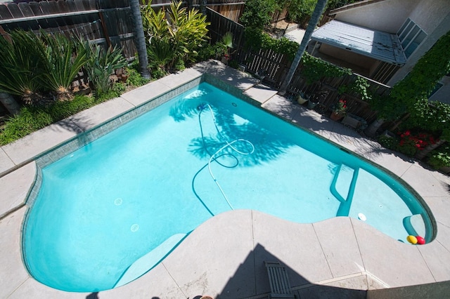 view of pool with fence
