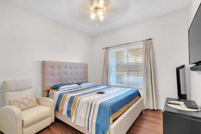 bedroom with dark wood finished floors and ceiling fan