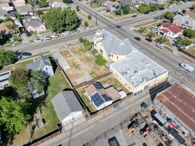 aerial view of property's location featuring nearby suburban area