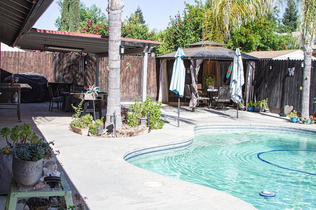 3694 W Robinson Ave, Fresno, CA 93722 - view of pool with a gazebo, a patio, and a fenced backyard