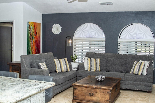 3694 W Robinson Ave, Fresno, CA 93722 - living area featuring ceiling fan and tile patterned floors