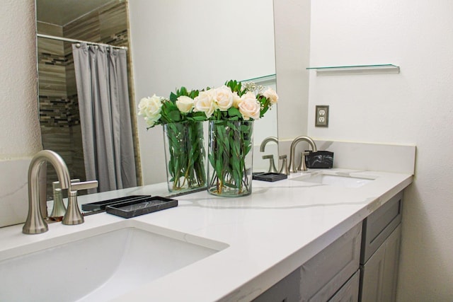 3694 W Robinson Ave, Fresno, CA 93722 - full bathroom with double vanity and a shower with curtain