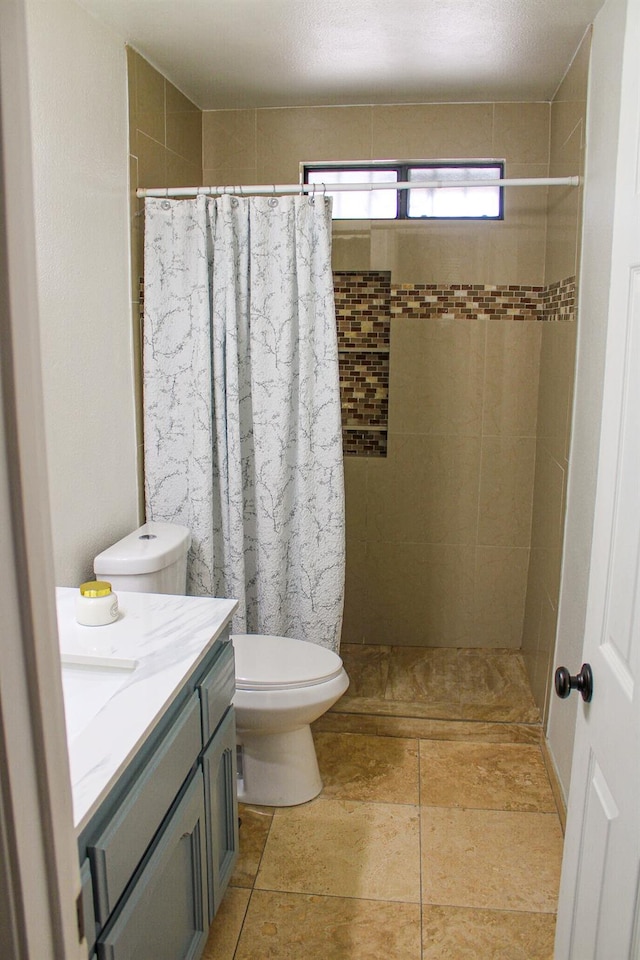 3694 W Robinson Ave, Fresno, CA 93722 - bathroom featuring vanity and tiled shower