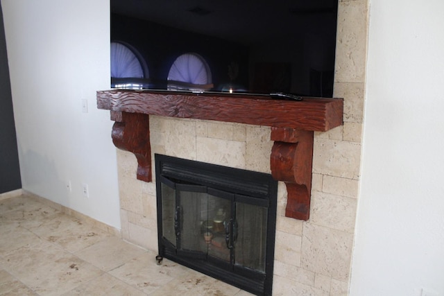 3694 W Robinson Ave, Fresno, CA 93722 - detailed view of a tile fireplace