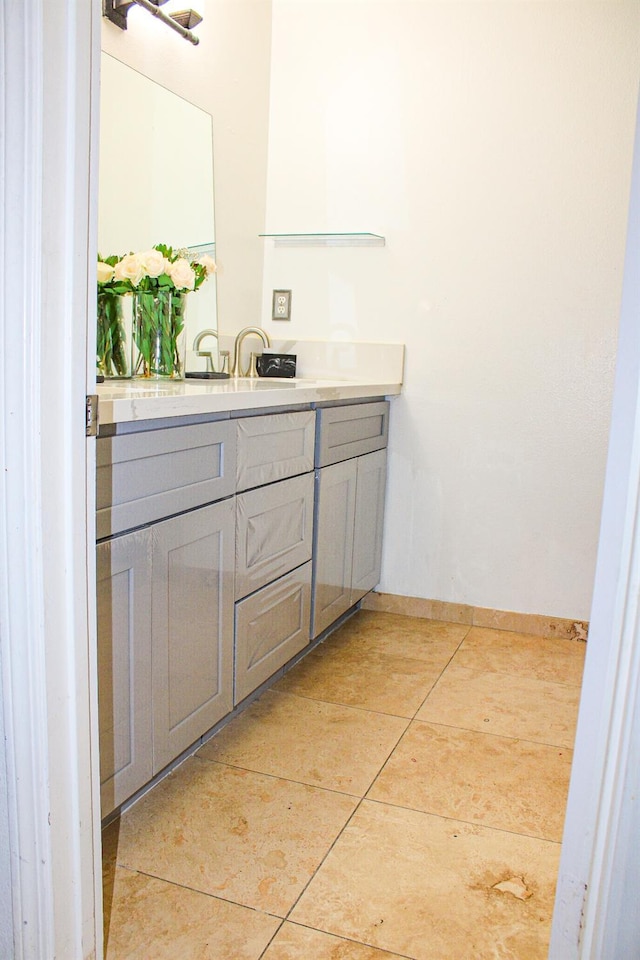 3694 W Robinson Ave, Fresno, CA 93722 - bathroom with vanity and tile patterned floors