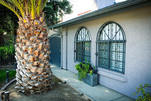 3694 W Robinson Ave, Fresno, CA 93722 - view of exterior entry featuring stucco siding
