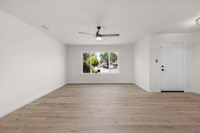 5706 N Tamera Ave, Fresno, CA 93711 - spare room featuring a ceiling fan, light wood-style floors, and baseboards