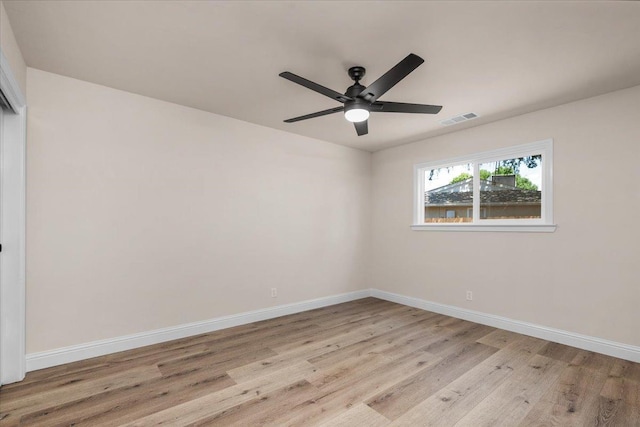 5706 N Tamera Ave, Fresno, CA 93711 - spare room featuring ceiling fan, light wood-style floors, and baseboards