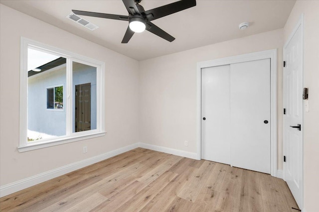 5706 N Tamera Ave, Fresno, CA 93711 - unfurnished bedroom with light wood-type flooring, a closet, baseboards, and ceiling fan