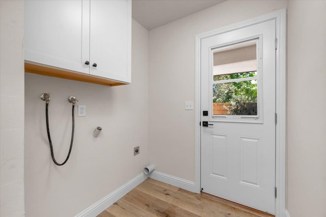 5706 N Tamera Ave, Fresno, CA 93711 - laundry area with cabinet space, electric dryer hookup, light wood-style floors, baseboards, and washer hookup