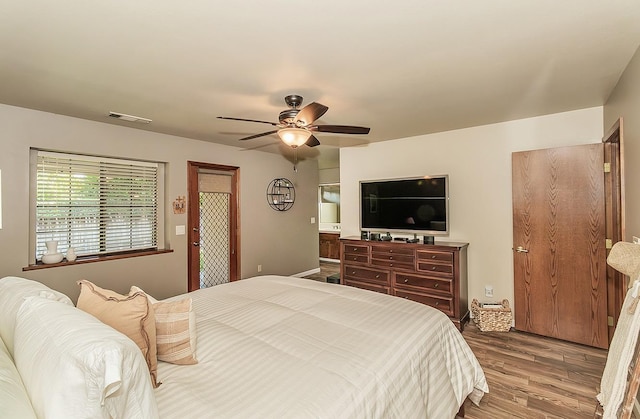 1025 E Cambridge Ave, Visalia, CA 93292 - bedroom with wood finished floors and ceiling fan