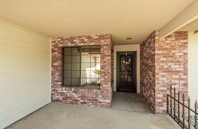 1025 E Cambridge Ave, Visalia, CA 93292 - entrance to property with brick siding and covered porch