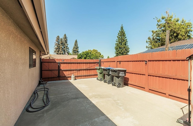 1025 E Cambridge Ave, Visalia, CA 93292 - view of patio featuring fence and a gate