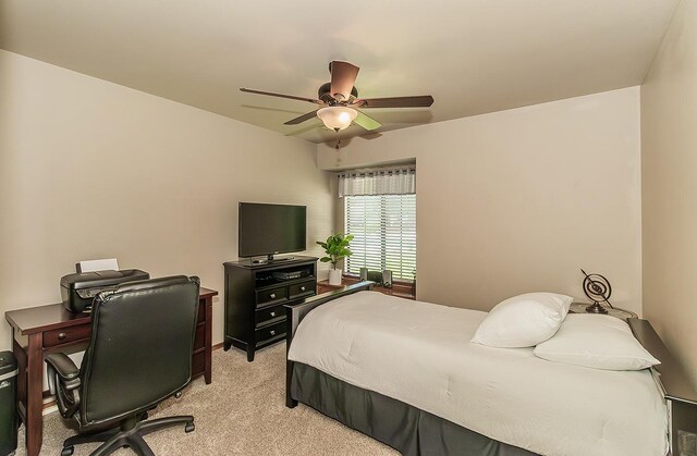 1025 E Cambridge Ave, Visalia, CA 93292 - bedroom with light carpet, an office area, and ceiling fan