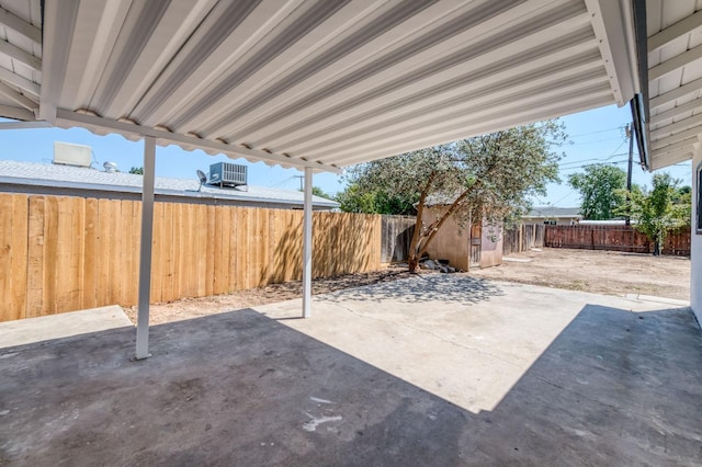 153 Birch, Fresno, CA 93650 - view of patio / terrace featuring a storage unit, a fenced backyard, an outbuilding, and central air condition unit